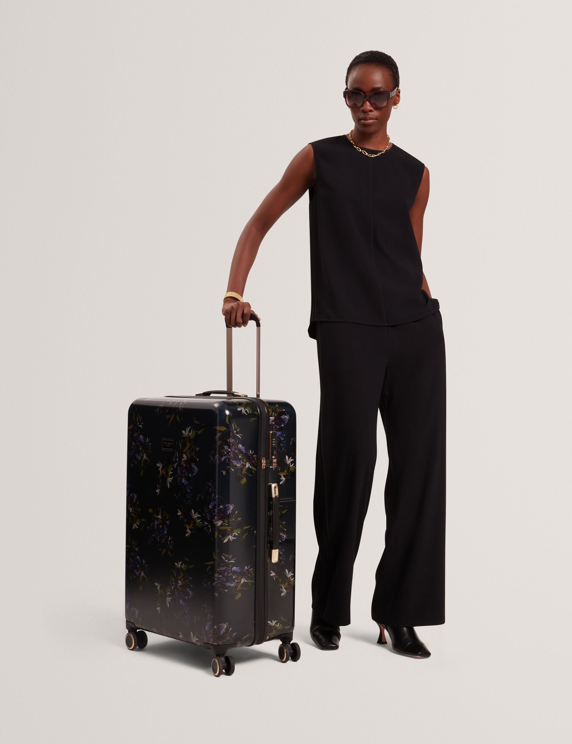 Dark Floral 4-wheel Hard Shell Large Suitcase | Mb-nvyl | Ted Baker UK