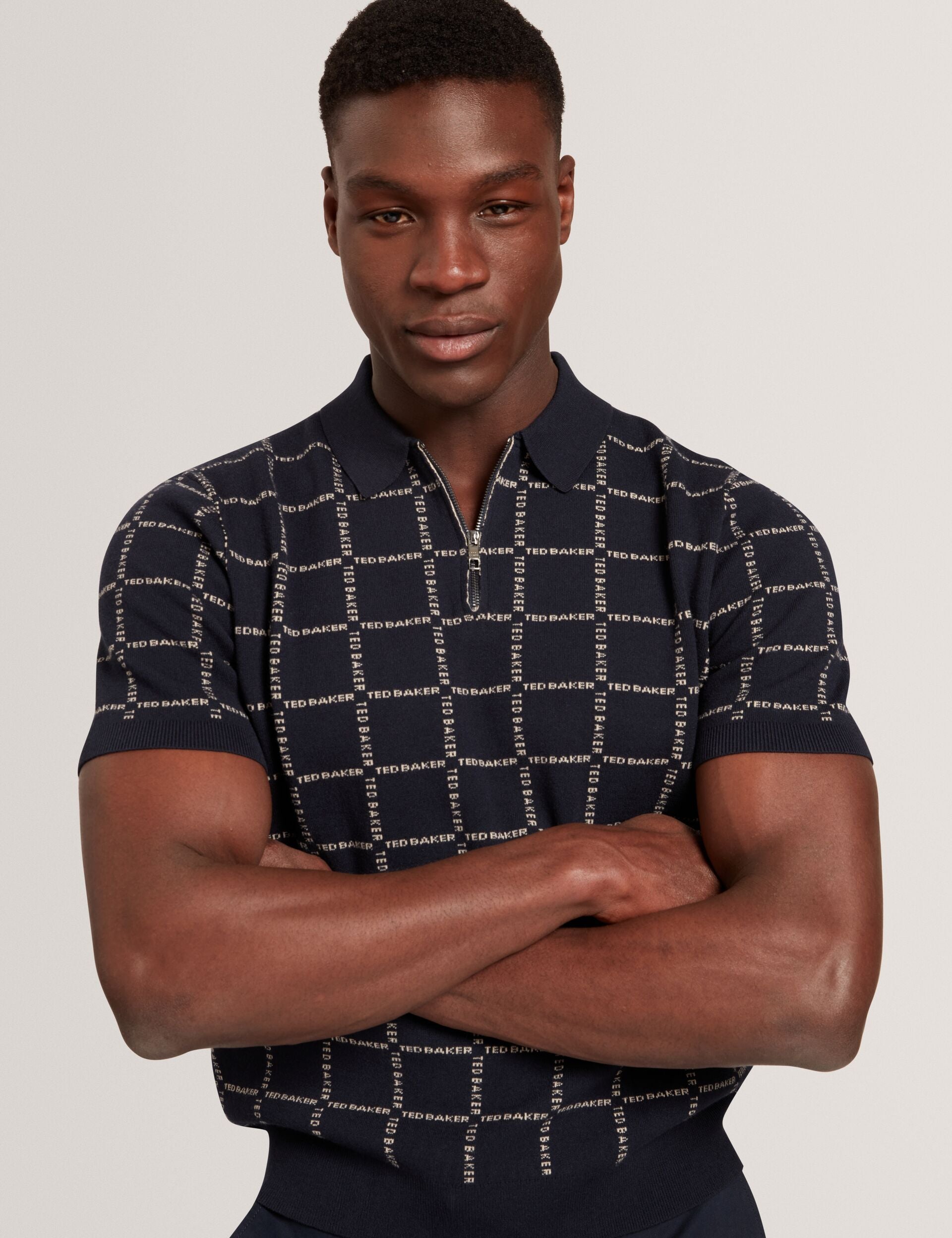 Branded Check Zip Neck Knit Polo | Harlens | Ted Baker UK